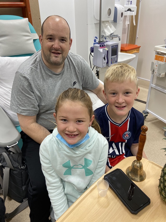 Archie pictured with his children